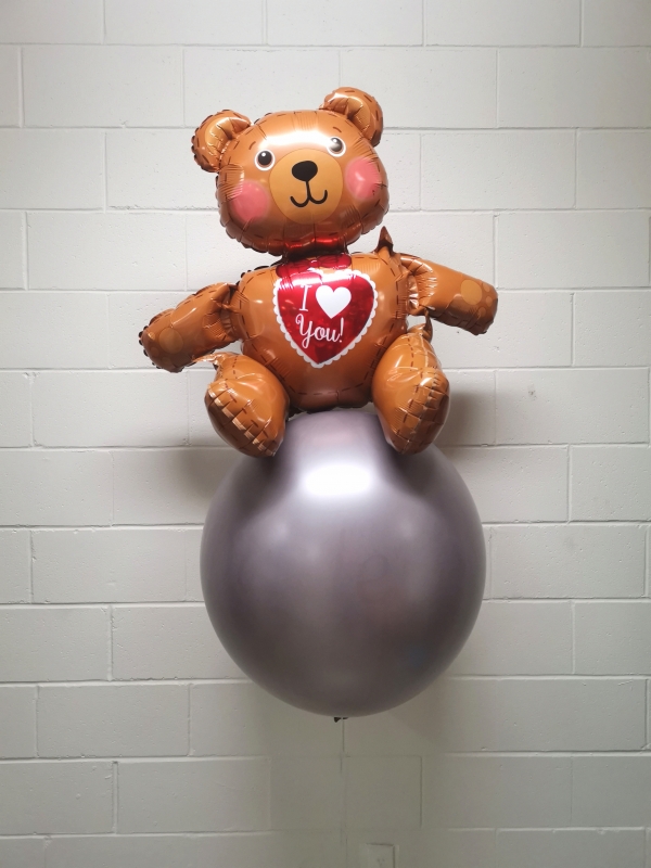 Bear Stuck To A Balloon 