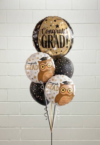 Congrats Grad Orbz with black and gold stars