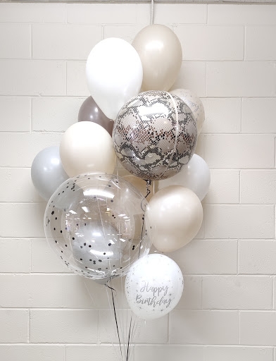 White sand birthday balloon bouquet