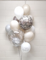 White sand birthday balloon bouquet
